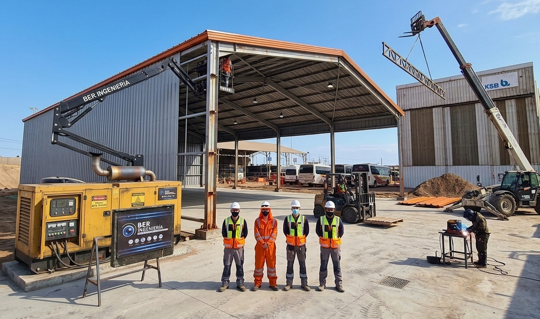 Estructura metálica en construcción con maquinaria de apoyo